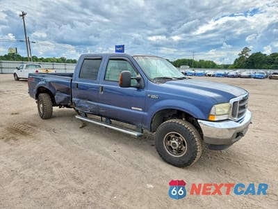 Czwarte zdjęcie samochodu z boku: 2004 FORD F350 SRW SUPER DUTY VIN:1FTSW31P44EB00194 - miniatura