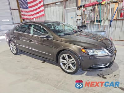Czwarte zdjęcie samochodu z boku: 2013 VOLKSWAGEN CC SPORT VIN:WVWBP7AN2DE545665 - miniatura