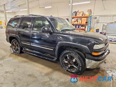Czwarte zdjęcie samochodu z boku: 2004 CHEVROLET TAHOE K1500 VIN:1GNEK13Z04J311144 - miniatura