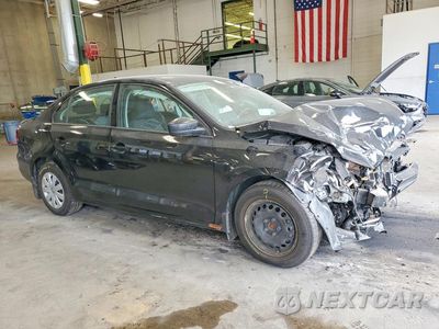Czwarte zdjęcie samochodu z boku: 2016 VOLKSWAGEN JETTA S VIN:3VW267AJ3GM276667 - miniatura