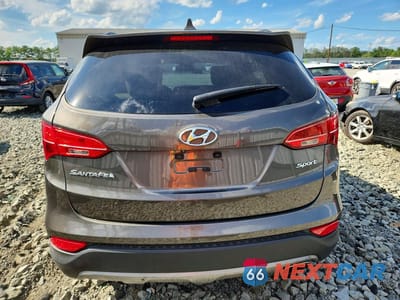 Zdjęcie 6 z 13 samochodu: 2014 HYUNDAI SANTA FE SPORT 2.4L VIN:5XYZU3LB8EG143922 - miniatura