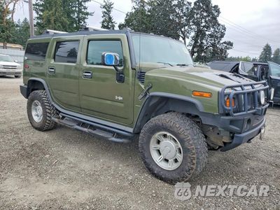 Czwarte zdjęcie samochodu z boku: 2004 HUMMER H2 SUV VIN:5GRGN23U64H105593 - miniatura