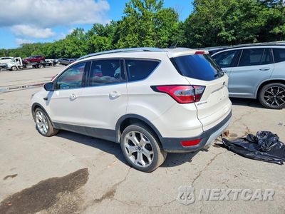 Drugie zdjęcie samochodu z przodu: 2017 FORD ESCAPE TITANIUM VIN:1FMCU9J98HUE21600 - miniatura
