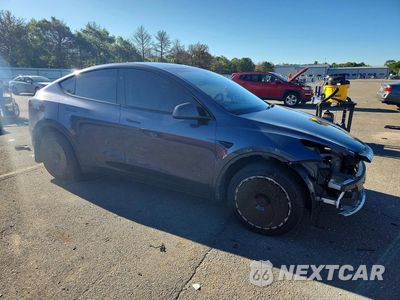 Czwarte zdjęcie samochodu z boku: 2023 TESLA MODEL Y VIN:7SAYGDEE2PA179048 - miniatura