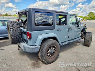 Trzecie zdjęcie samochodu z tyłu: 2015 JEEP WRANGLER UNLIMITED SAHARA VIN:1C4BJWEG5FL546024 - miniatura