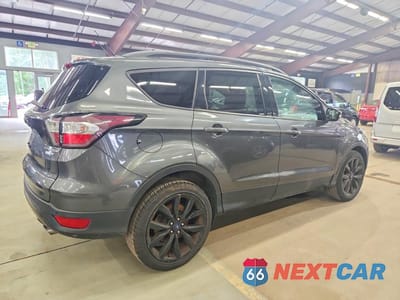 Trzecie zdjęcie samochodu z tyłu: 2017 FORD ESCAPE TITANIUM VIN:1FMCU9JD7HUE81744 - miniatura