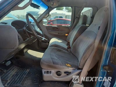 Zdjęcie 7 z 12 samochodu: 2000 FORD F150 VIN:1FTRX17W0YKA86509 - miniatura
