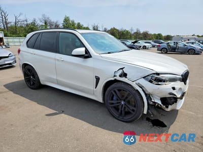 Czwarte zdjęcie samochodu z boku: 2015 BMW X5 M VIN:5YMKT6C55F0C89163 - miniatura