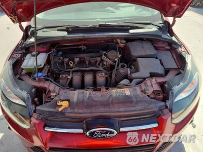 Zdjęcie 11 z 12 samochodu: 2014 FORD FOCUS TITANIUM VIN:1FADP3N21EL149036 - miniatura