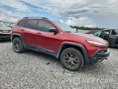 Czwarte zdjęcie samochodu z boku: 2015 JEEP CHEROKEE TRAILHAWK VIN:1C4PJMBS4FW594003 - miniatura
