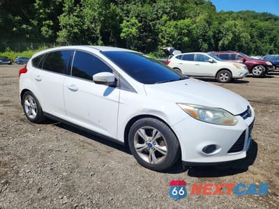 Czwarte zdjęcie samochodu z boku: 2014 FORD FOCUS SE VIN:1FADP3K20EL141434 - miniatura