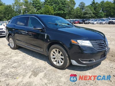 Czwarte zdjęcie samochodu z boku: 2017 LINCOLN MKT VIN:2LMHJ5NK9HBL00282 - miniatura