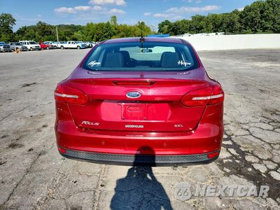 Zdjęcie 6 z 12 samochodu: 2017 FORD FOCUS SEL VIN:1FADP3H22HL342487 - miniatura