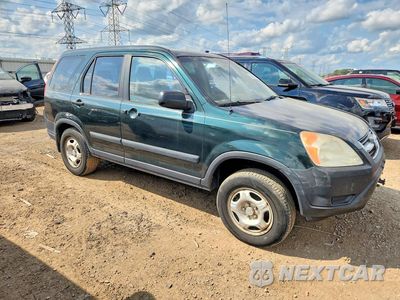 Czwarte zdjęcie samochodu z boku: 2004 HONDA CR-V LX VIN:JHLRD68474C014202 - miniatura