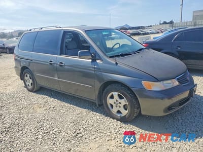 Czwarte zdjęcie samochodu z boku: 2000 HONDA ODYSSEY EX VIN:2HKRL1861YH519666 - miniatura
