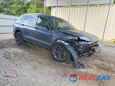 Czwarte zdjęcie samochodu z boku: 2023 VOLKSWAGEN TIGUAN SE VIN:3VV3B7AX1PM044609 - miniatura