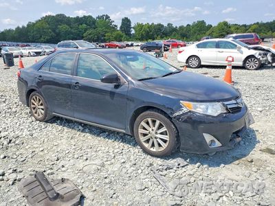 Czwarte zdjęcie samochodu z boku: 2014 TOYOTA CAMRY XLE VIN:4T1BF1FK7EU334141 - miniatura