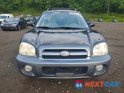 Piąte zdjęcie samochodu w środku: 2005 HYUNDAI SANTA FE GLS VIN:KM8SC73EX5U865134 - miniatura