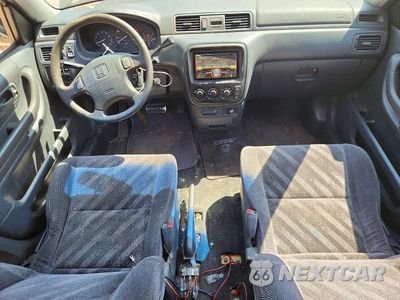 Zdjęcie 8 z 12 samochodu: 1999 HONDA CR-V LX VIN:JHLRD2848XC007434 - miniatura