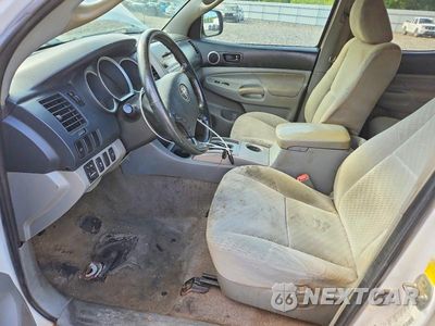 Zdjęcie 7 z 12 samochodu: 2011 TOYOTA TACOMA V6 VIN:3TMLU4EN1BM067784 - miniatura