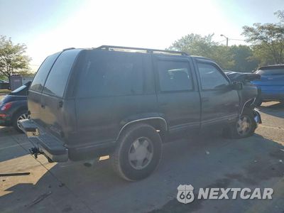 Trzecie zdjęcie samochodu z tyłu: 1996 CHEVROLET TAHOE K1500 VIN:1GNEK13R5TJ347152 - miniatura