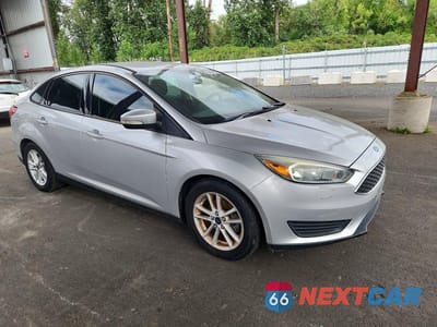 Czwarte zdjęcie samochodu z boku: 2015 FORD FOCUS SE VIN:1FADP3F23FL277018 - miniatura