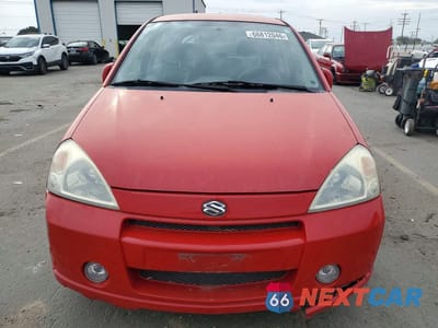 Piąte zdjęcie samochodu w środku: 2003 SUZUKI AERIO SX VIN:JS2RD41H735202404 - miniatura