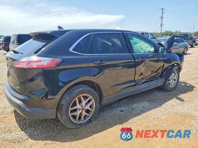 Trzecie zdjęcie samochodu z tyłu: 2023 FORD EDGE SEL VIN:2FMPK4J91PBA19108 - miniatura