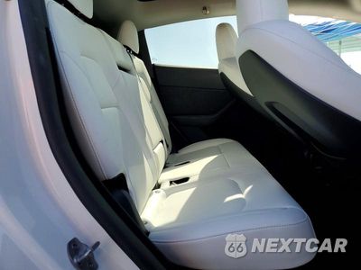 Zdjęcie 10 z 12 samochodu: 2024 TESLA MODEL Y VIN:7SAYGDEE5RA265408 - miniatura