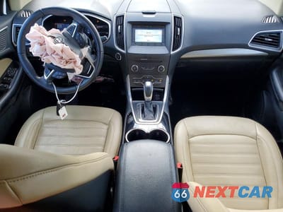 Zdjęcie 8 z 12 samochodu: 2018 FORD EDGE SEL VIN:2FMPK4J90JBC19520 - miniatura