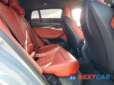 Zdjęcie 10 z 12 samochodu: 2022 BMW X4 M VIN:5YM23EC03N9M71823 - miniatura