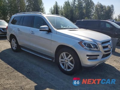 Czwarte zdjęcie samochodu z boku: 2015 MERCEDES-BENZ GL 450 4MATIC VIN:4JGDF6EE2FA597318 - miniatura