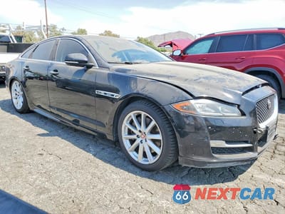 Czwarte zdjęcie samochodu z boku: 2016 JAGUAR XJ VIN:SAJWA1C74G8W03018 - miniatura