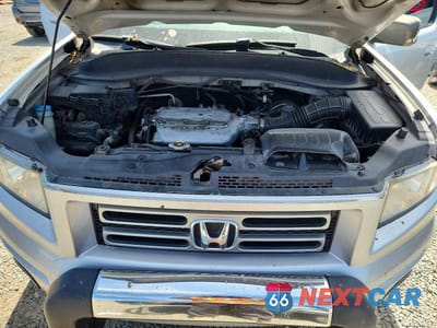 Zdjęcie 11 z 13 samochodu: 2006 HONDA RIDGELINE RTL VIN:2HJYK16516H513215 - miniatura
