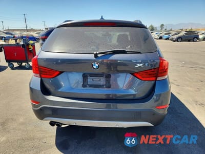 Zdjęcie 6 z 13 samochodu: 2014 BMW X1 SDRIVE28I VIN:WBAVM1C5XEVW50517 - miniatura