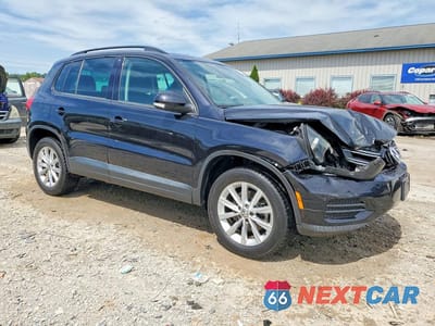Czwarte zdjęcie samochodu z boku: 2015 VOLKSWAGEN TIGUAN S VIN:WVGAV7AX0FW513597 - miniatura