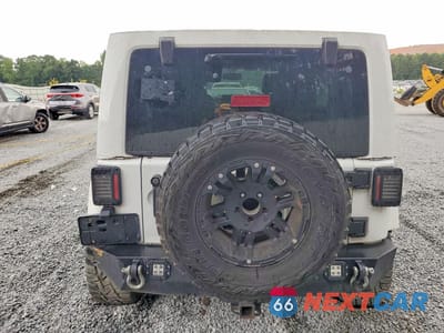 Zdjęcie 6 z 13 samochodu: 2014 JEEP WRANGLER UNLIMITED SAHARA VIN:1C4HJWEG8EL182450 - miniatura