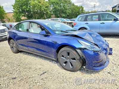 Czwarte zdjęcie samochodu z boku: 2023 TESLA MODEL 3 VIN:5YJ3E1EA1PF600379 - miniatura