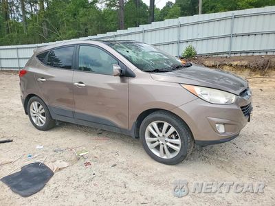 Czwarte zdjęcie samochodu z boku: 2011 HYUNDAI TUCSON LIMITED VIN:KM8JU3AC7BU172407 - miniatura