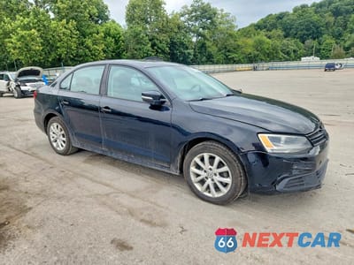 Czwarte zdjęcie samochodu z boku: 2011 VOLKSWAGEN JETTA SE VIN:3VWDZ7AJ2BM316830 - miniatura
