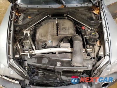 Zdjęcie 12 z 13 samochodu: 2013 BMW X5 XDRIVE35I VIN:5UXZV4C57D0B06055 - miniatura