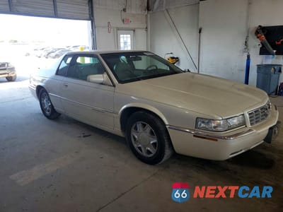 Czwarte zdjęcie samochodu z boku: 1997 CADILLAC ELDORADO VIN:1G6EL12Y0VU607041 - miniatura