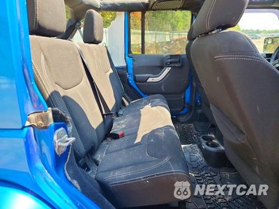 Zdjęcie 10 z 13 samochodu: 2015 JEEP WRANGLER UNLIMITED SAHARA VIN:1C4BJWEG3FL588952 - miniatura