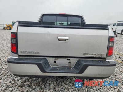 Zdjęcie 6 z 12 samochodu: 2014 HONDA RIDGELINE VIN:5FPYK1F60EB011367 - miniatura
