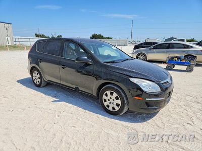 Czwarte zdjęcie samochodu z boku: 2010 HYUNDAI ELANTRA TOURING GLS VIN:KMHDB8AE5AU085492 - miniatura