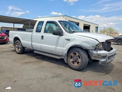 Czwarte zdjęcie samochodu z boku: 1999 FORD F250 SUPER DUTY VIN:1FTNX20L2XEA55733 - miniatura