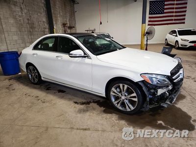 Czwarte zdjęcie samochodu z boku: 2017 MERCEDES-BENZ C 300 4MATIC VIN:55SWF4KB7HU188736 - miniatura