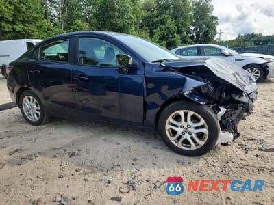 Czwarte zdjęcie samochodu z boku: 2016 SCION IA BASE VIN:3MYDLBZV1GY118658 - miniatura