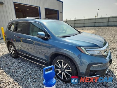 Czwarte zdjęcie samochodu z boku: 2019 HONDA PILOT TOURING VIN:5FNYF6H60KB091014 - miniatura