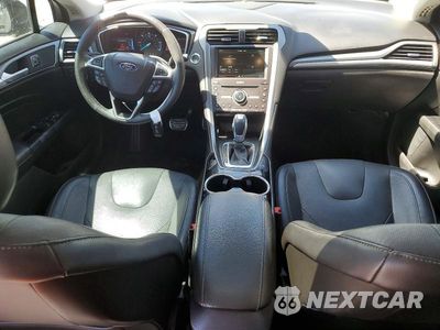 Zdjęcie 8 z 13 samochodu: 2016 FORD FUSION TITANIUM HEV VIN:3FA6P0RU6GR306373 - miniatura